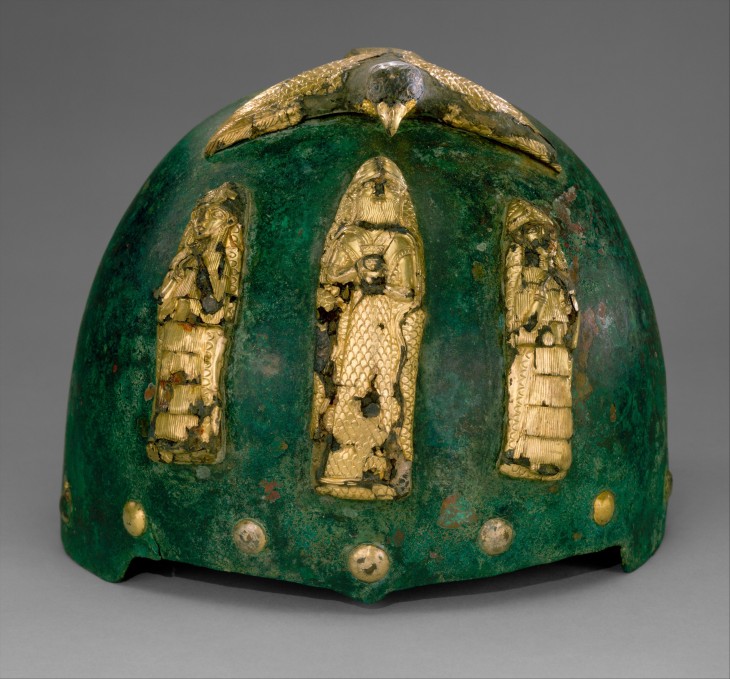 Helmet with divine figures beneath a bird with outstretched wings middle elamite 15th century bc